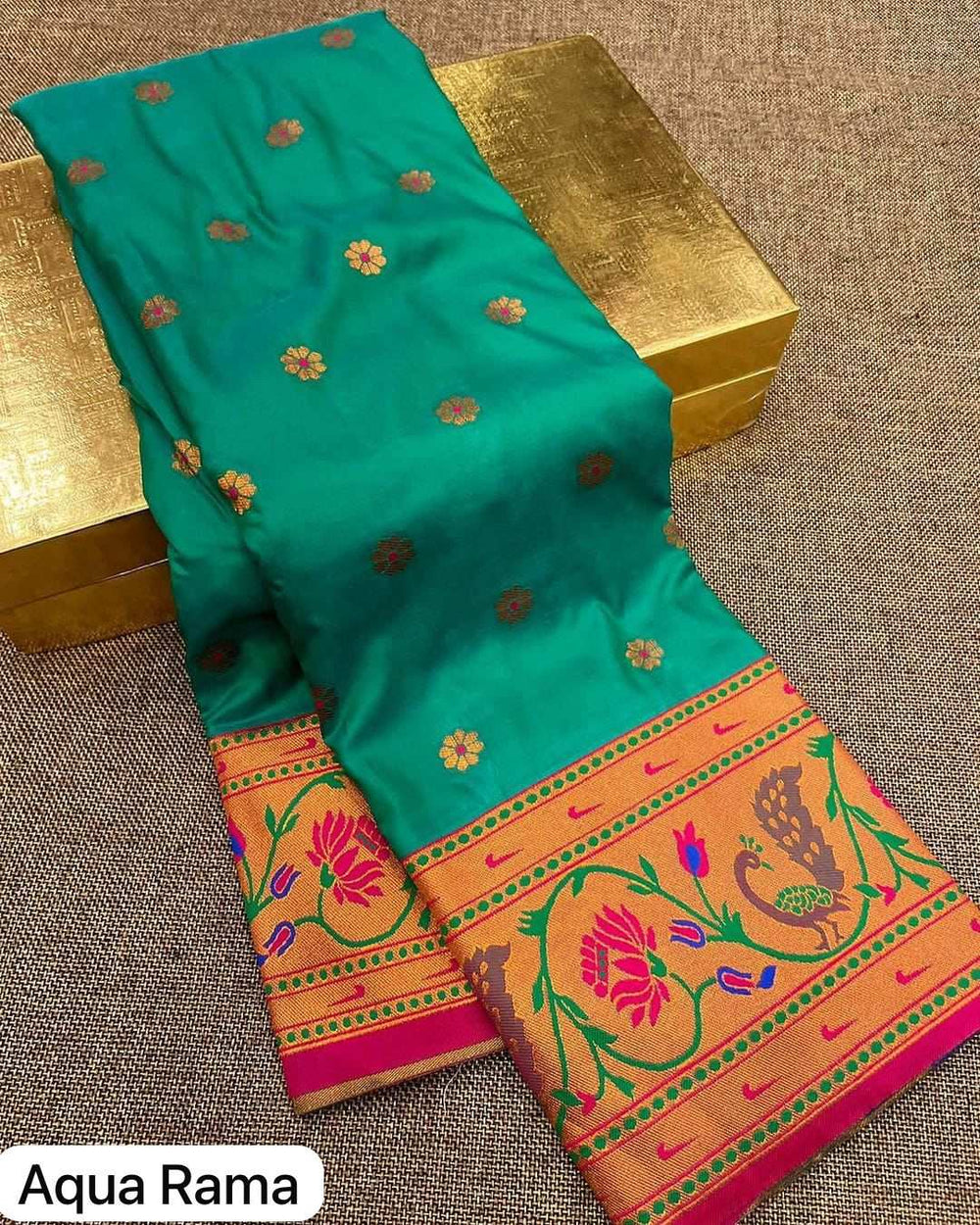 Sea-green Aqua Rama shade with orange woven peacock and lotus border