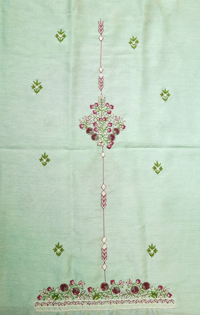 Kurta panel of the unstitched set laid flat, central floral motif with a bootied ground and hem border