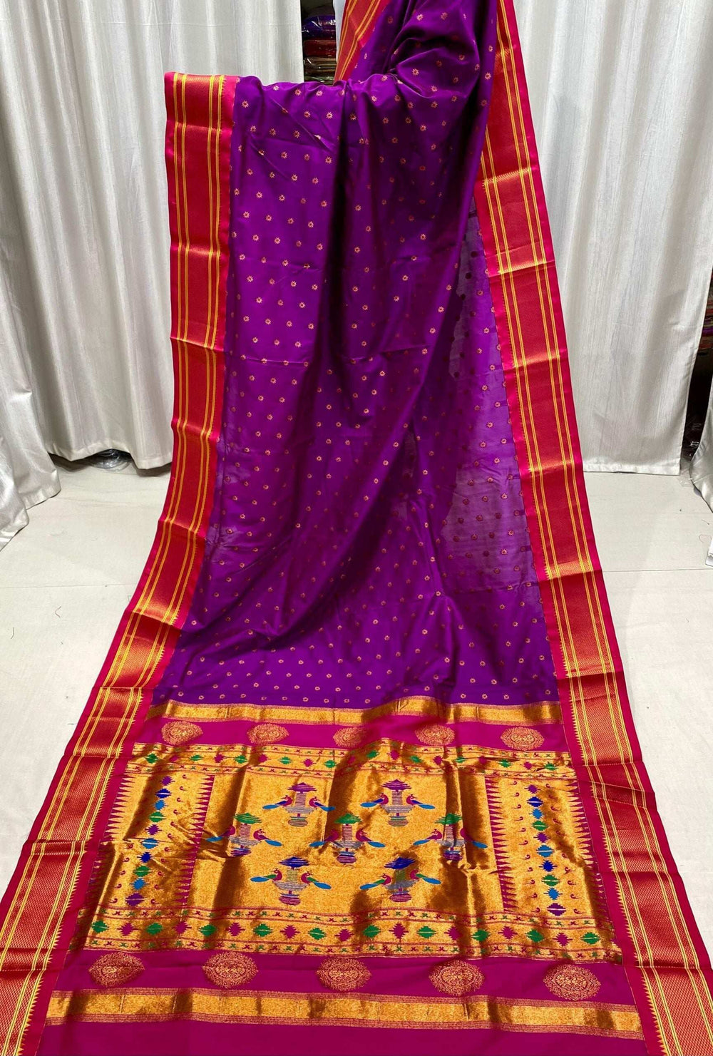 Purple kadiyal Paithani draped full length, red border and gold pallu motifs