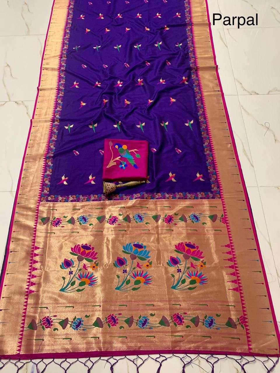 Purple colourway of the single muniya Paithani, rani pink blouse piece on top