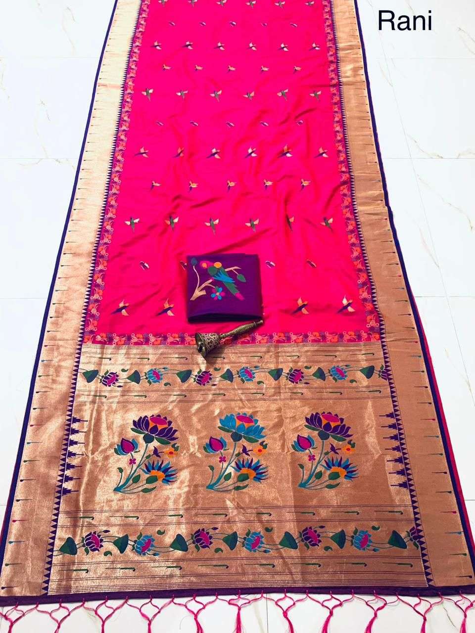 Rani pink single muniya Paithani with purple border, flat-laid full length