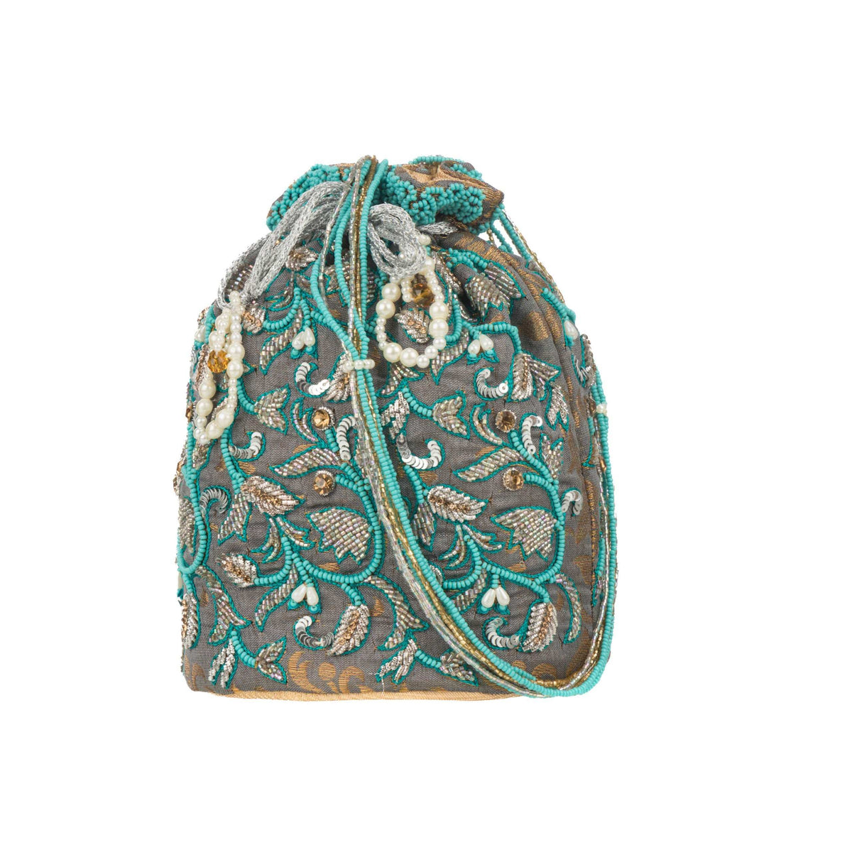 Front of the bag showing zari leaves and scattered sequins on a grey ground