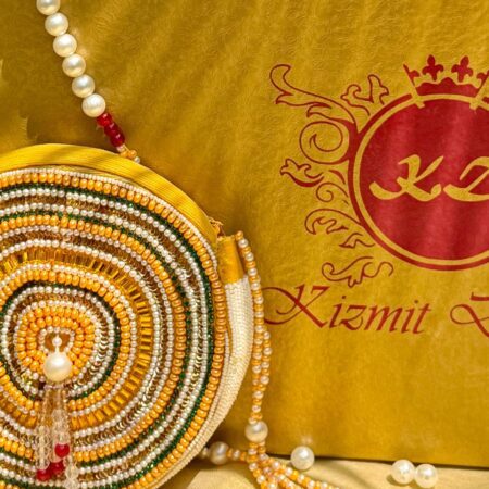 SAANJHIKA HAND EMBROIDERED ROUND BAG